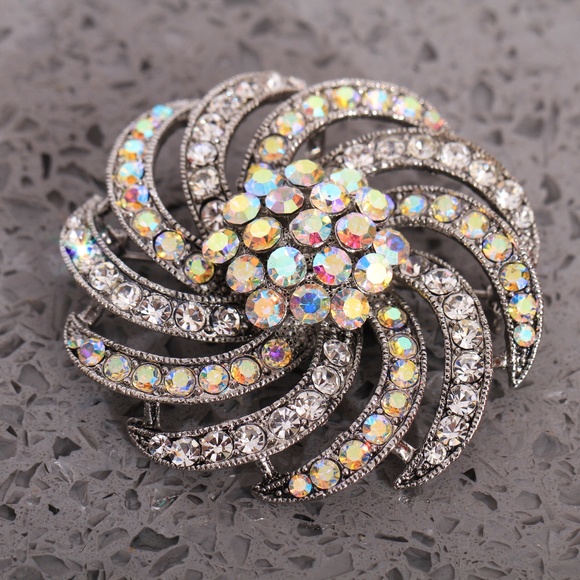 Jewelry - A Vintage Rhinestone Swirl Brooch